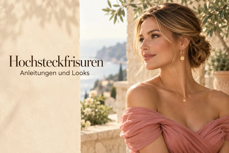 Hochsteckfrisuren: Frau mit lockerem, tiefem Dutt und Strähnen am Gesicht, rosa Schulterkleid und feiner Goldkette